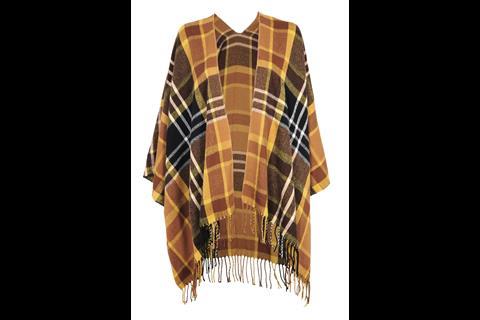 Ponchos are set to be a must-have fashion product this winter, and Topshop is backing a tartan number.